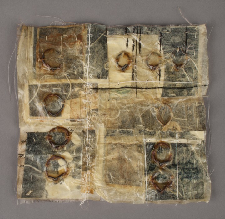 Detail of Kry Bastian, Our Work, 1997, paper, fabric, steel, thread and ink, 36 pieces, each 5 x 5 inches (12.7 x 12.7 cm). © Kry Bastian / Photo: Laura Mitchell