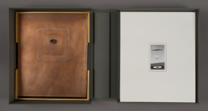 Left: Spent Bullet and right: Plain Air from Dove Bradshaw, The Art of Dove Bradshaw: Nature, Change, and Indeterminacy, 2003, artist’s book: mixed media, 13 ¾ x 11 7/8 x 3 ½ inches (34.9 x 30.2 x 8.9 cm), closed. Published by Mark Batty Publisher, New York. © Dove Bradshaw / Photo: Laura Mitchell