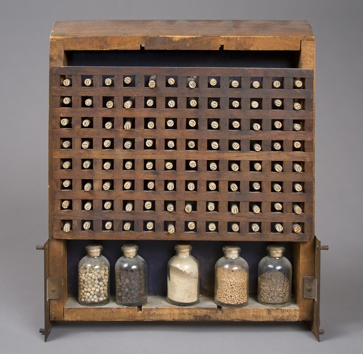 Lenore Tawney, Biblioteca Chemica, 1966, wood construction with metal, glass vials and seeds, 14 x 11 ¾ x 2 ⅞ inches (35.6 x 29.8 x 7.3 cm). © Lenore G. Tawney Foundation / Photo: Ellen McDermott